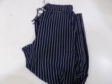 navy blue and white striped pants on a white table
