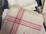 many pieces of cloth that are on a table