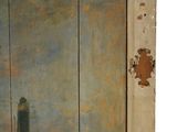 a painting of a lighthouse on the side of a building