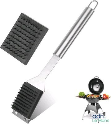 a close up of a spatula with a grill on it