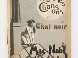 an old book with a picture of a woman sitting on a chair