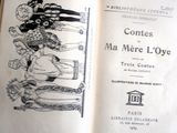 un livre ouvert avec la photo d'un homme et d'une femme