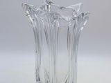 a glass vase that is sitting on a table