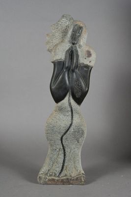 an image of a statue of a woman with her hands on her face