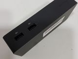 an image of a close up of a power strip on a table