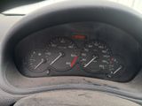 a close up of a car dashboard with a speedometer