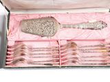 a box with a set of silverware inside of it