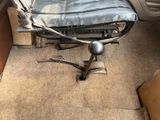 a chair that is sitting in the back of a car