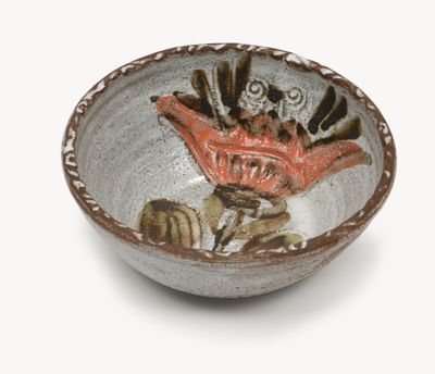 a small bowl with a design on it