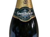 bottle of champagne with a gold cap and label on a white background