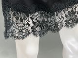an image of a black and white lace skirt on a mannequin mannequin mannequin mann