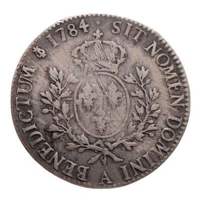 gros plan d'une pièce de monnaie surmontée d'une couronne