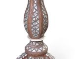 a vase that is sitting on top of a table