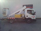 a white truck with a crane on the back of it