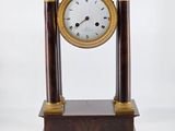 a clock that is sitting on top of a table