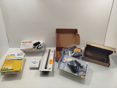 a box with a mouse and other items on a table