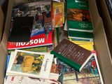 a box full of books sitting on the floor
