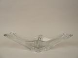 a glass bowl that is sitting on a table