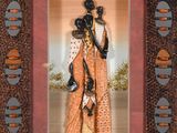 framed picture of a woman in a sari holding a phone