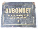 a picture of a sign that says dubonneet vin tonique au quinquina