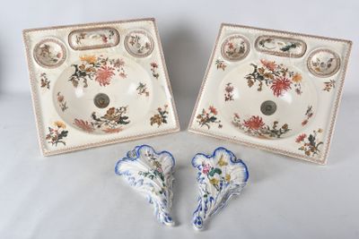 two pieces of porcelain on a white table