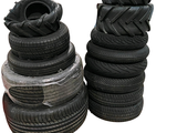 a lot of tires stacked on top of each other