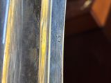 a close up view of a piece of metal that has been scratched off