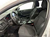 the interior of a car with the door open and the driver ' s seat down