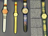 many different watches on display in a display case