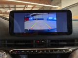 a rear view camera mounted on the dash of a car