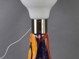 an image of a lamp that is sitting on top of a table