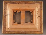 an old wooden picture frame with a broken window in the middle