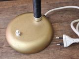 an image of a table lamp with a cord plugged into it