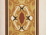 un vieux livre sur lequel figure une illustration représentant un motif décoratif