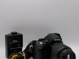 a camera and a battery on a white background