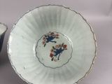 a small bowl and a small bowl on a table