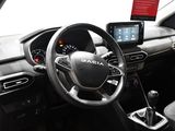 the interior of a car with a steering wheel, dashboard, and dash board