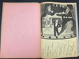an open book with a picture of a man in a tuxedo on it