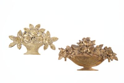 two gold vases with flowers in them on a white background