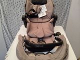 a baby stroller that is sitting on a white table