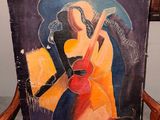 tableau représentant une femme jouant de la guitare, assise sur une chaise