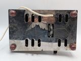 a metal box with a wire attached to it