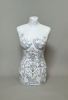 an image of a white mannequin with a black and white design