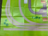 an image of a green paper with a road map on it