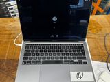 a laptop that is sitting on a table in a room