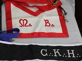 three different types of aprons on a white table