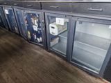 a refrigerator that is sitting in the middle of a room
