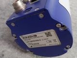 an image of a blue and white device on the floor