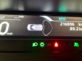 a close up of a car dashboard showing the speed of the car