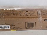 a close up of two boxes with a sticker on top of them